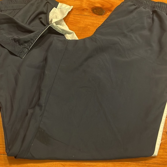 Large Nike navy blue white side stripe pockets split side athletic track pants - Picture 3 of 16